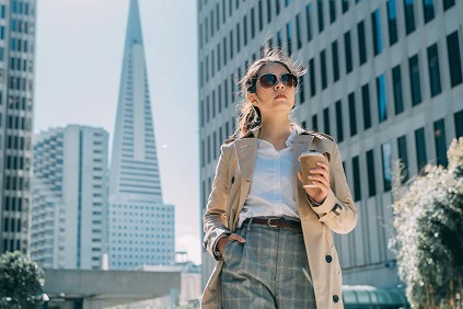 Young Professional Woman In City