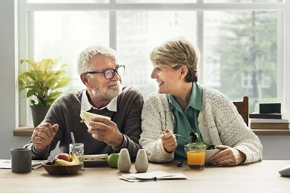 Retired Couple Eating At Home