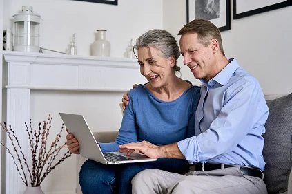 Retired Couple Using Laptop